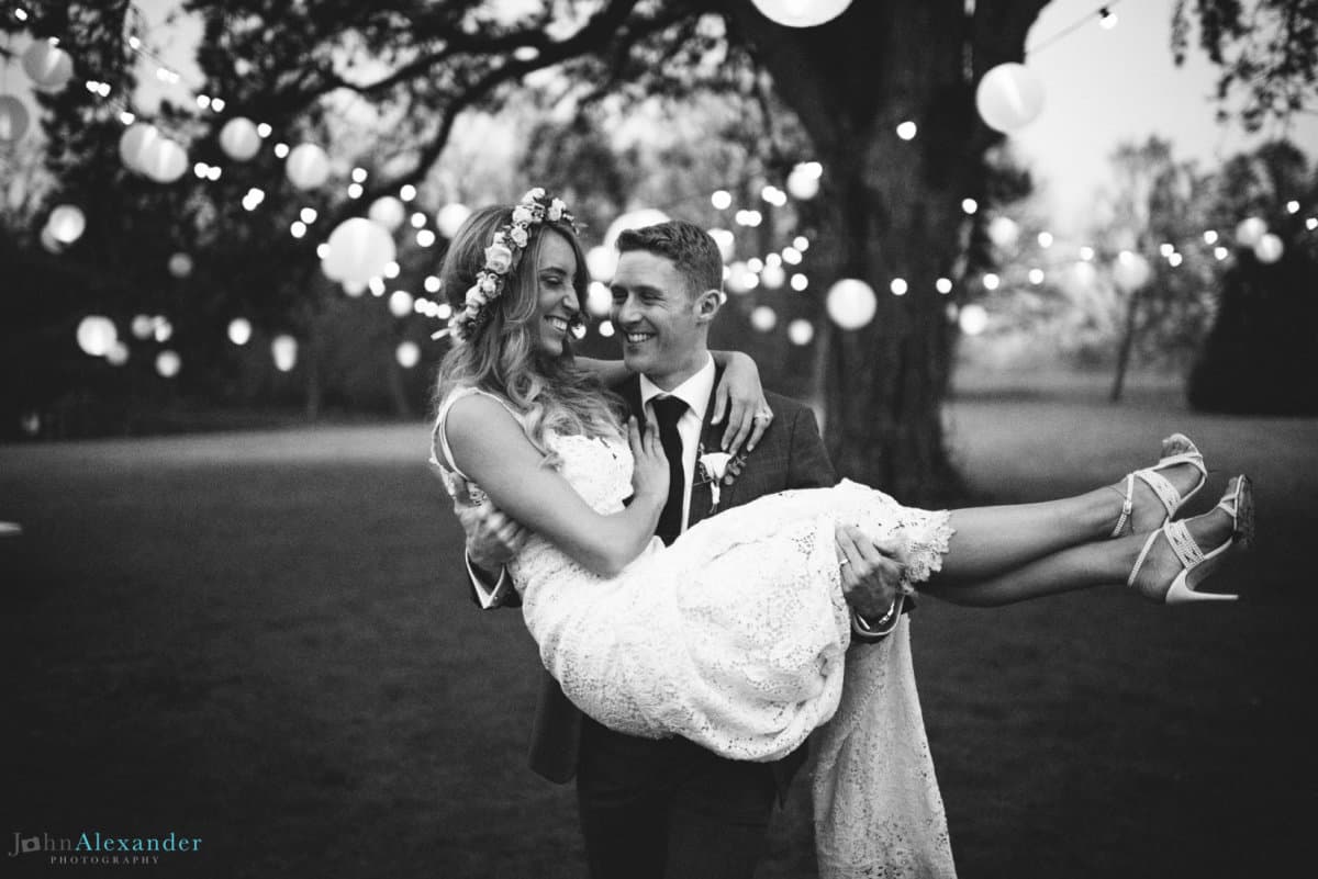 Chloe and Stu's wedding with beautiful fairy light installations and atmospheric wedding lighting design