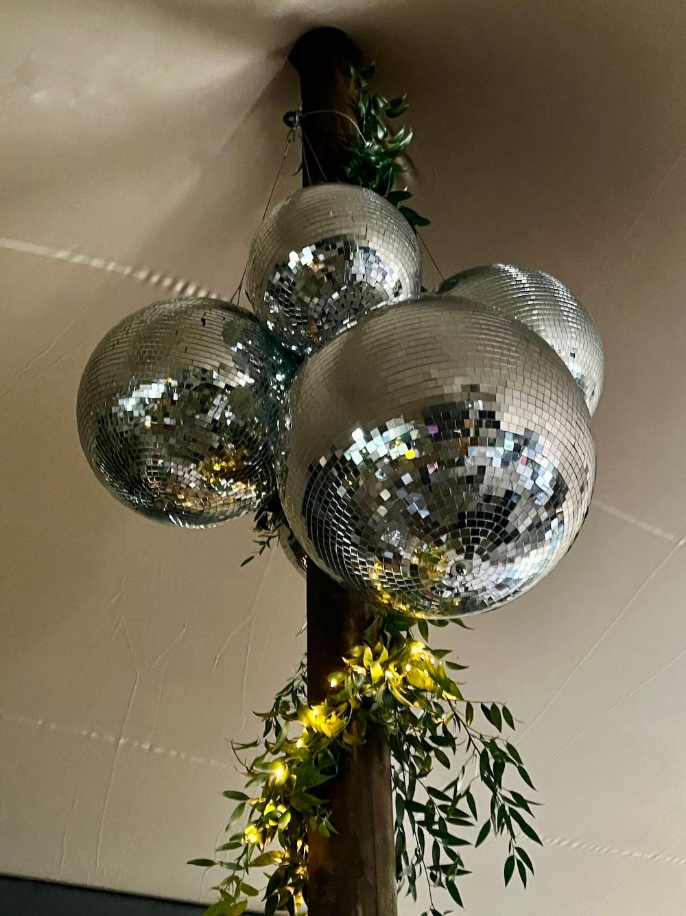Mirrorball cluster and glitterball clusters creating disco atmosphere on the dance floor