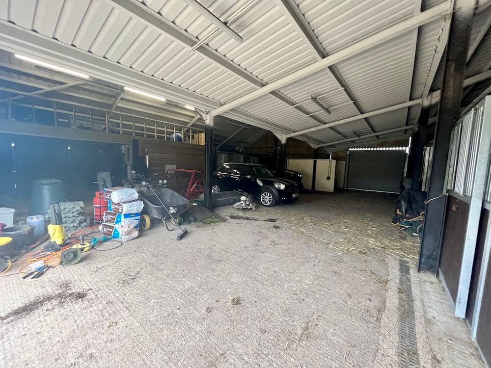 Barn before transformation - empty space ready for styling and lighting design