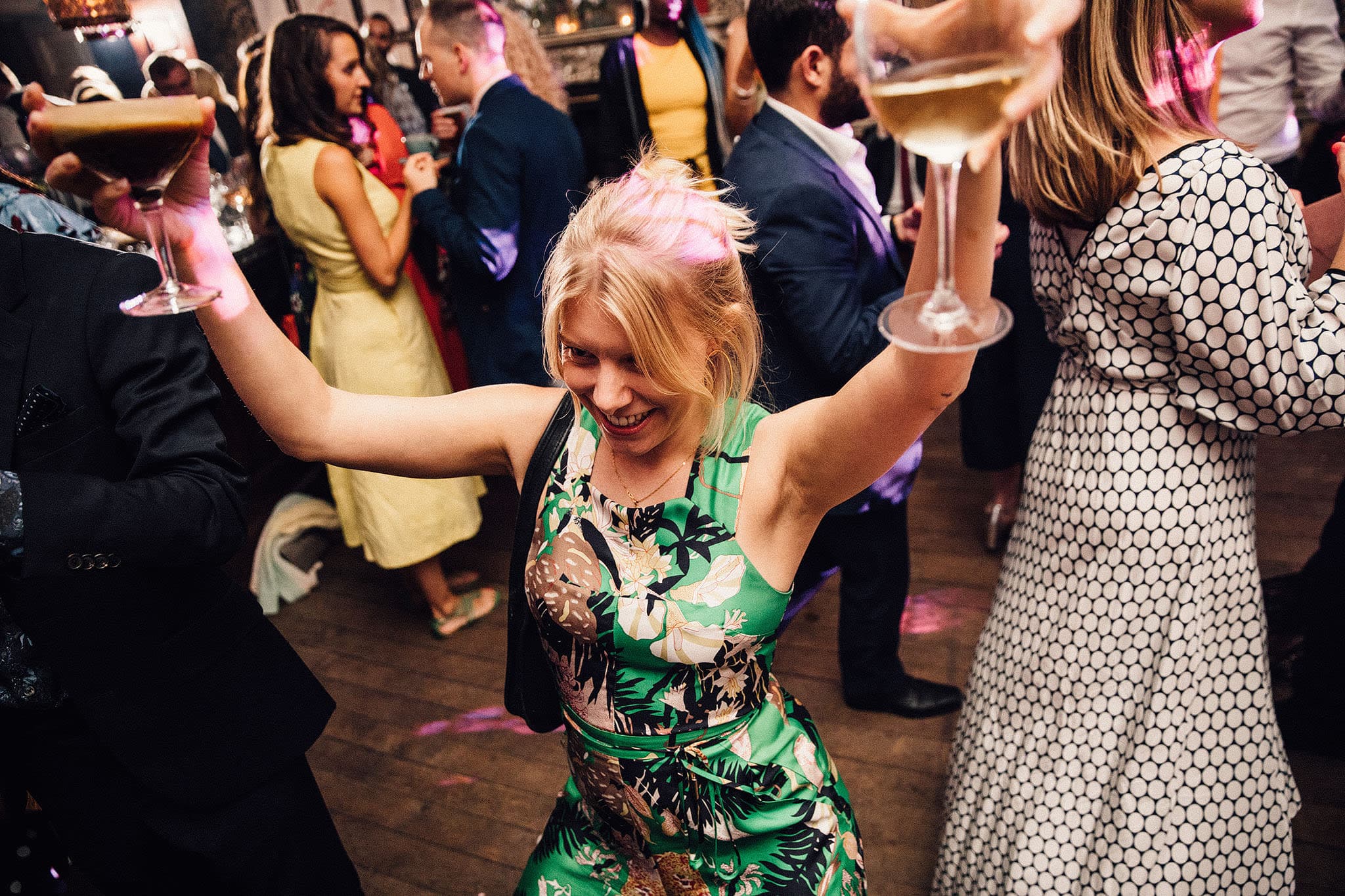 Jade and Emma's wedding celebration with elegant lighting