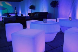 LED furniture with Shisha Pipes and topiary in a themed room setting at a wedding venue. with Oil Projection on white fabric panels.